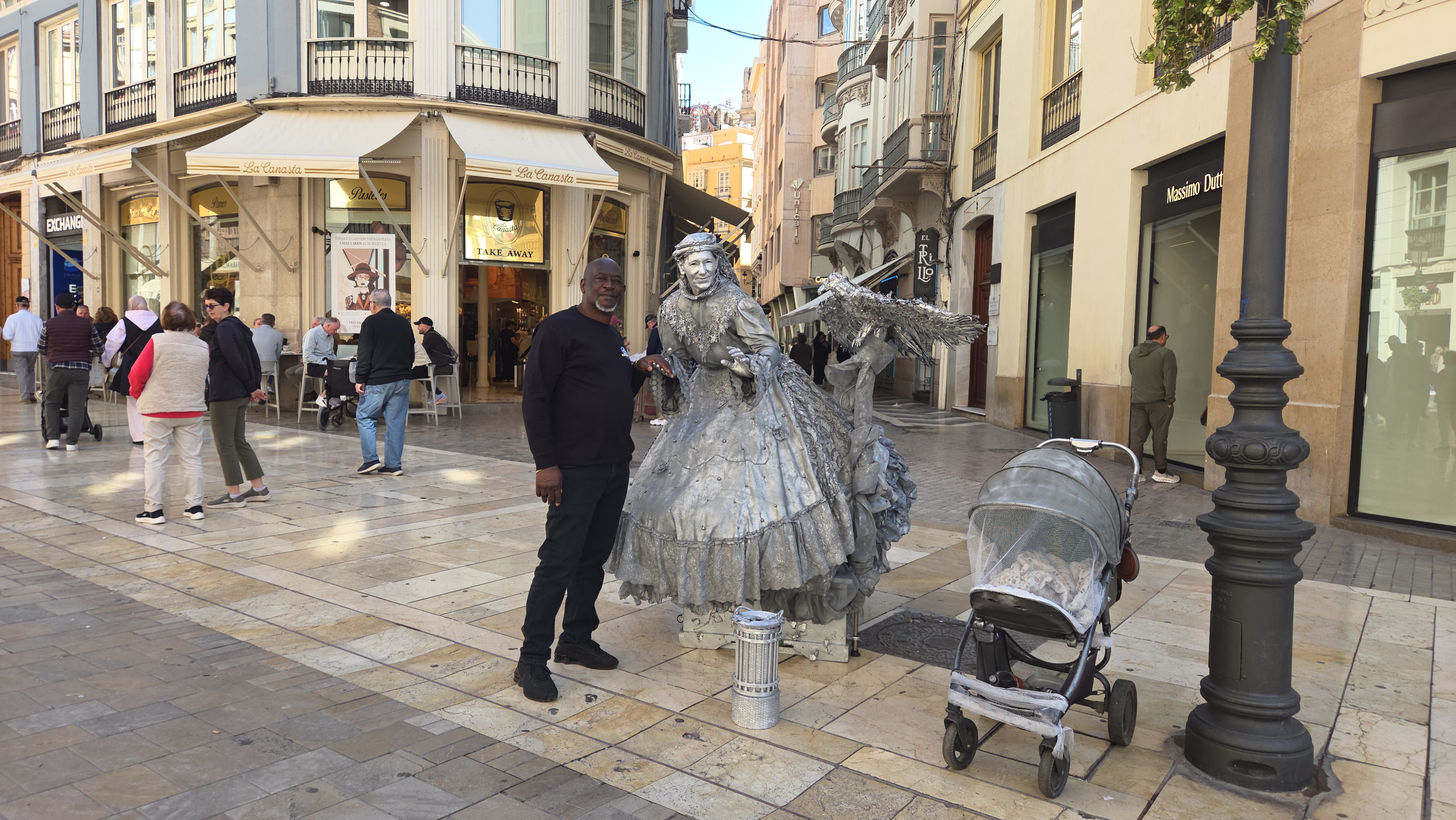 Posing with silver living statue